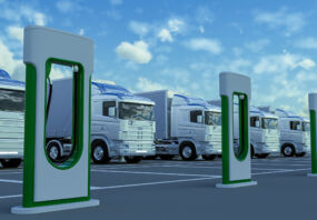 Electric trucks in charging station